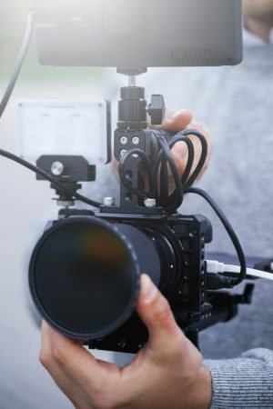 Videographer with a modern mirrorless camera rig